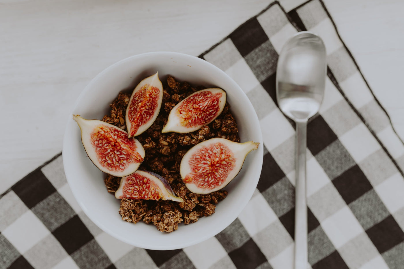 Bowl of crunchy granola and figs